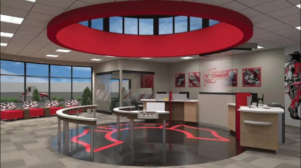 A branch interior rendering I directed: the helmet shield inlaid in the floor, firefighter art on the walls and “not just for” written over the name behind the tellers.