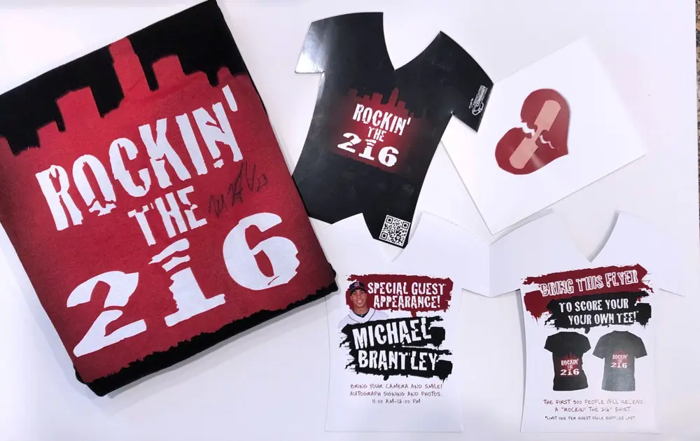 “Rockin’ the 216”: campaign tees, flyers and event pieces that let members wear the brand.